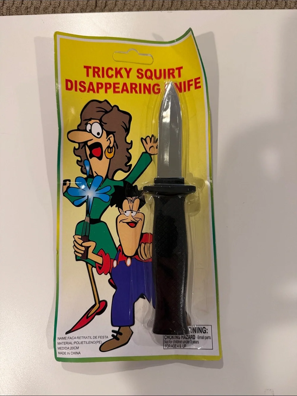 Novelty Tricky Squirt Disappearing Knife - Black